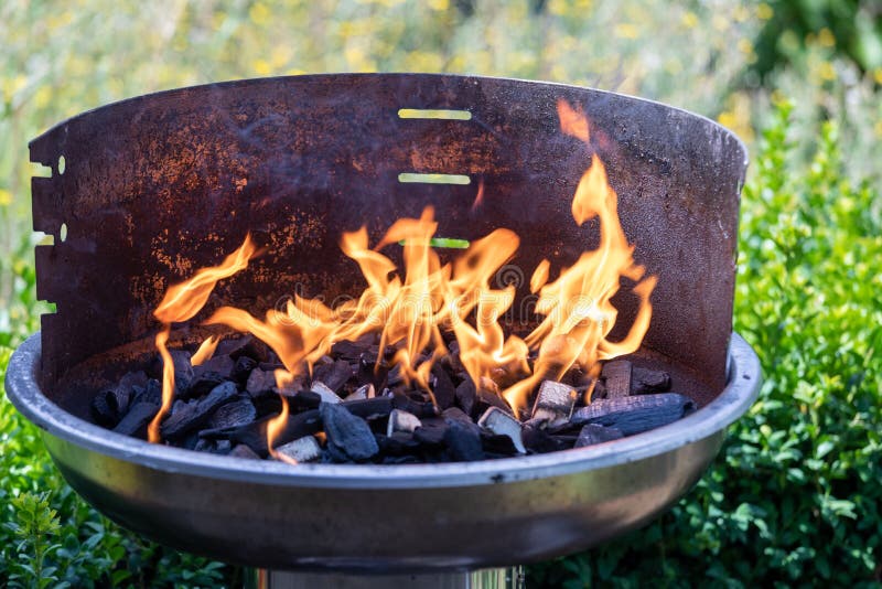 Barbecue Grill with Fire on Nature, Outdoor, Close Up Stock Image