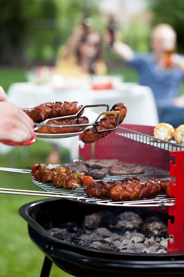 Barbecue with grilled sausages