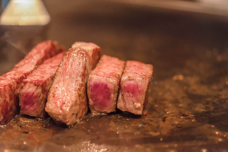 Barbecue Kobe steak, Selected focus on a dry aged Wagyu entrecote steak on hot plate royalty free stock photos Barbecue Kobe steak, Selected focus on a dry aged Wagyu entrecote steak on hot plate royalty free stock photos