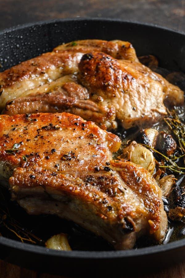 Barbecue Pork Chops on the Bone with Seasonings and Grilled on Hot ...