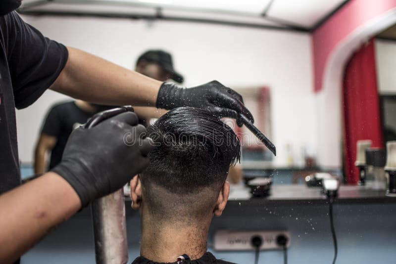Man is Doing a Modern Haircut in Barbershop. Barber Spray Moistens Hair Stock Photo - Image of grooming, barbershop: 190002244 Man is Doing a Modern Haircut in Barbershop. Barber Spray Moistens Hair Stock Photo - Image of grooming, barbershop: 190002244