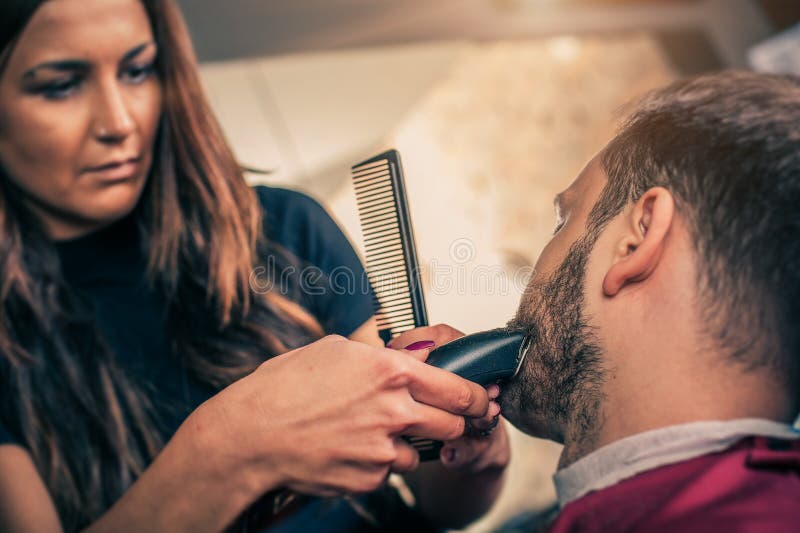 Barber Beard Cut a Client S Beard with Trimmer Stock Image Image of client, sepia 74369637