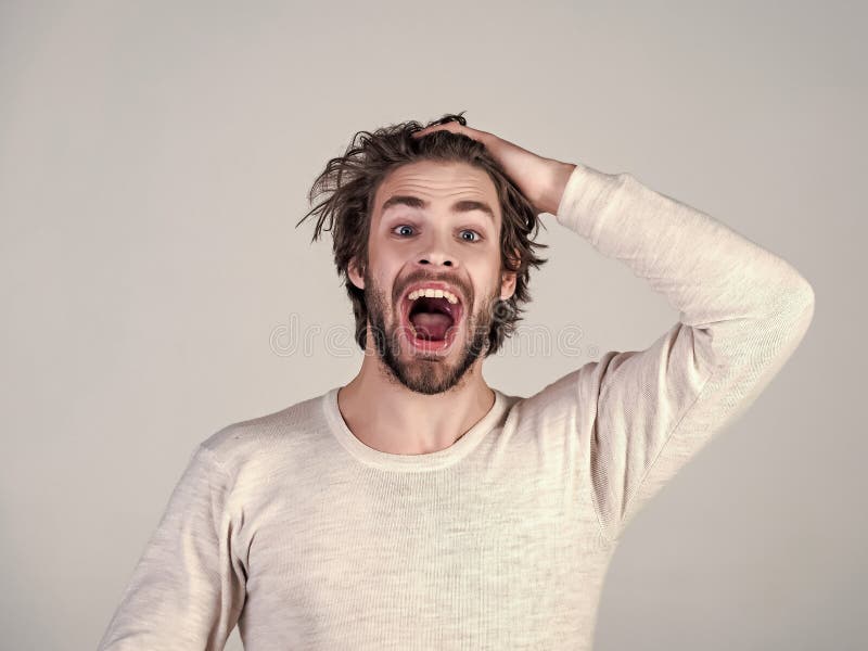 Disheveled Male Standing Like Shell-shocked Touching Hair Stock Image -  Image of posing, grunge: 202897141