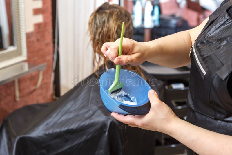 The Barber`s Hands Stir the Hair Dye Stock Image Image of