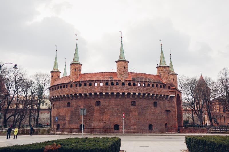 Barbikan gate in Krakow city  Poland. Barbakan museum. Krakow attractions. Traveling in spring. Barbikan gate in Krakow city  Poland. Barbakan museum. Krakow attractions. Traveling in spring