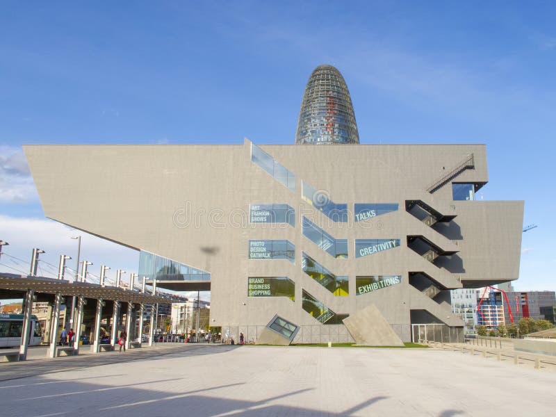 Design Museum and Barcelona Design Center with Agbar Tower behind in Barcelona Spain. Design Museum and Barcelona Design Center with Agbar Tower behind in Barcelona Spain