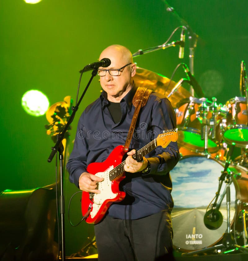 BARCELONA, SPAIN - APRIL 26, 2019: Famous British guitarist Mark Knopfler in concert at Palau Sant Jordi, Barcelona, Spain. BARCELONA, SPAIN - APRIL 26, 2019: Famous British guitarist Mark Knopfler in concert at Palau Sant Jordi, Barcelona, Spain