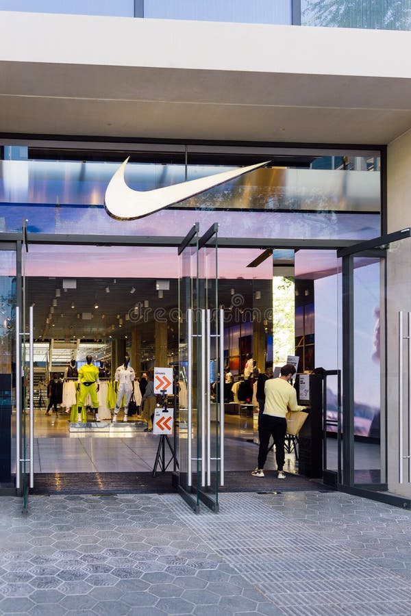 Barcelona, Spain - April 3, 2021. Logo and Facade of Nike, an American Multinational Company Dedicated the Design, Development Editorial Image - Image of architecture, accessories: 215447740