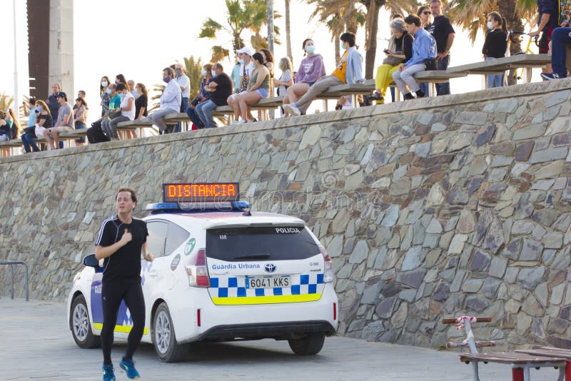 Barcelona, Spain - MAY 23, 2020: Barcelona beach police car. Covid 19 coronaviruse disease. Barcelona beach closed. Protect