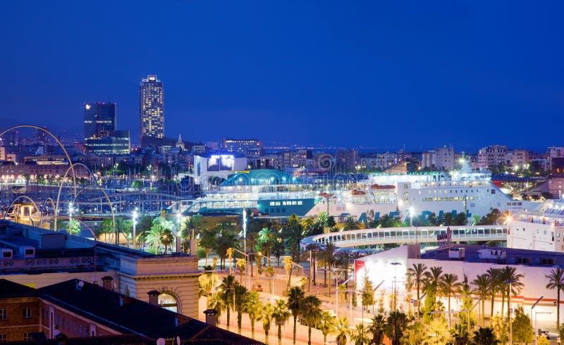 Barcelona, Spain skyline at night. Horbor view