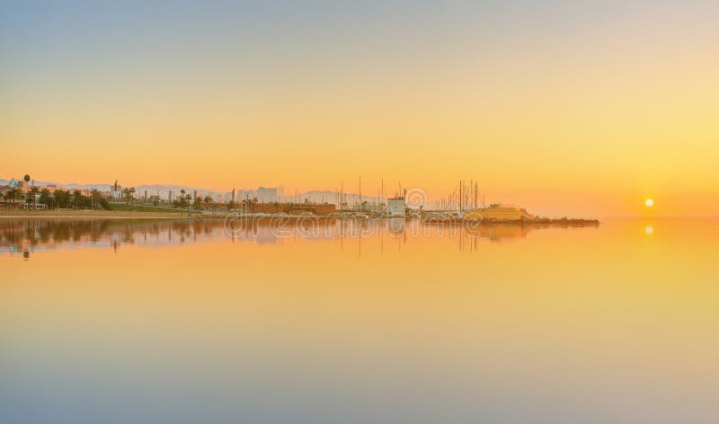Barceloneta Beach in Barcelona at sunrise royalty free stock photo Barceloneta Beach in Barcelona at sunrise royalty free stock photo