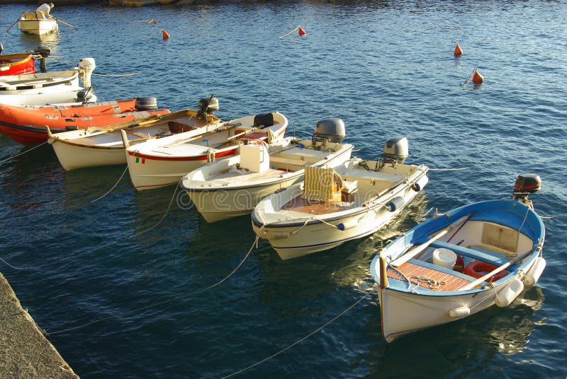 Boats on Ligurian Sea (the Mediterranean), in Manarola's harbour, Cinque Terre National Park, Italy. Boats on Ligurian Sea (the Mediterranean), in Manarola's harbour, Cinque Terre National Park, Italy.