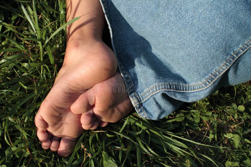 Bare feet of a little girl