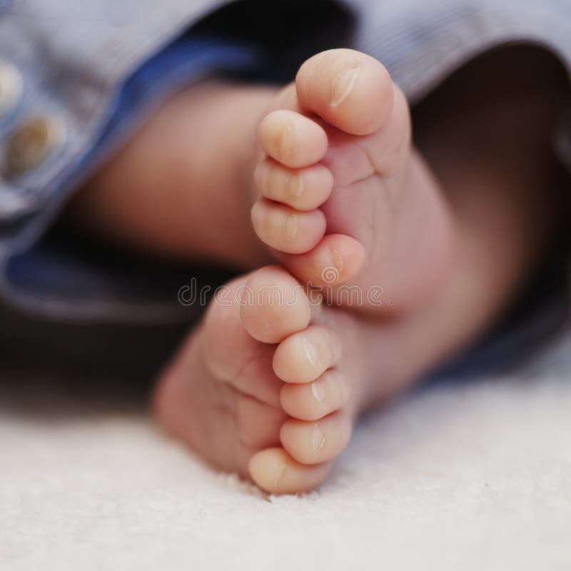 Newborn Baby With Bare Feet Stock Photo Image of barefoot, american
