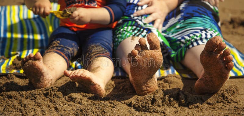 Bare feet and Sand at the Beach. stock photography