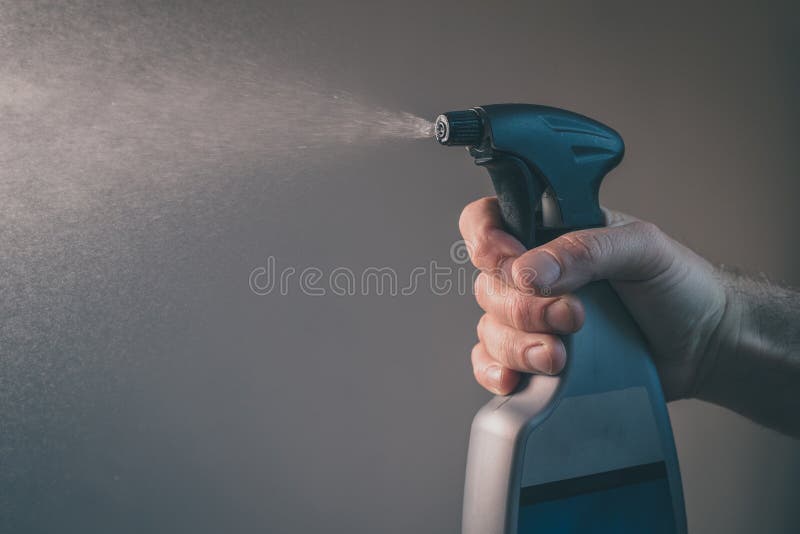 Plastic Spray Bottle in Action Stock Image Image of household, hand