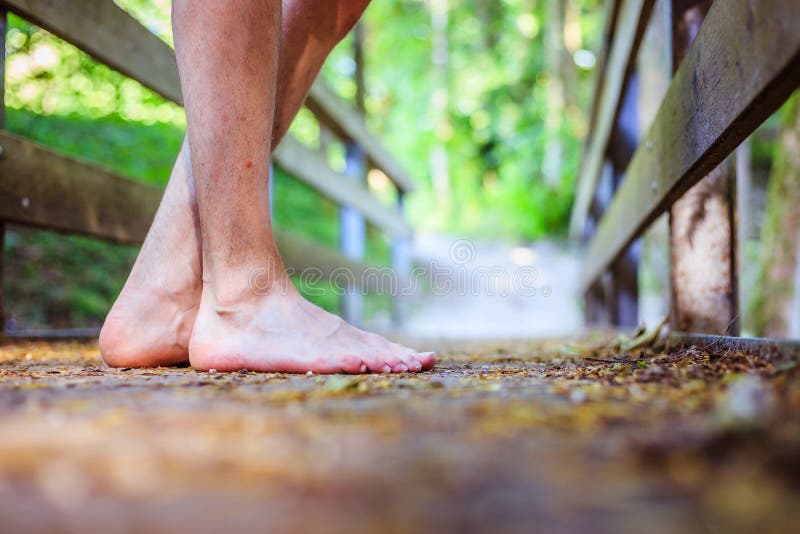 Forest Adventure: Closeup of Barefoot Male Feet on a Wooden Bridge in the  Woodland Stock Image - Image of discovery, fitness: 176339489