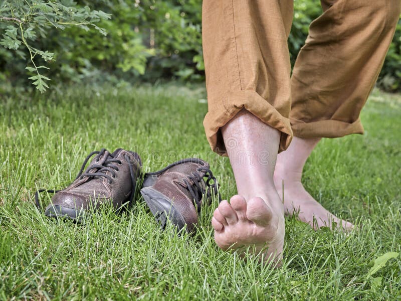 Barefoot walking, earthing and grounding concept