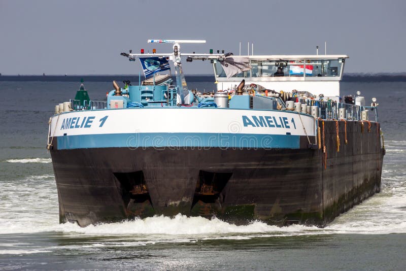 Barge on the Meuse river in the Port of Rotterdam. September 3, 2016