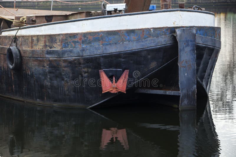 Barge with red anchor