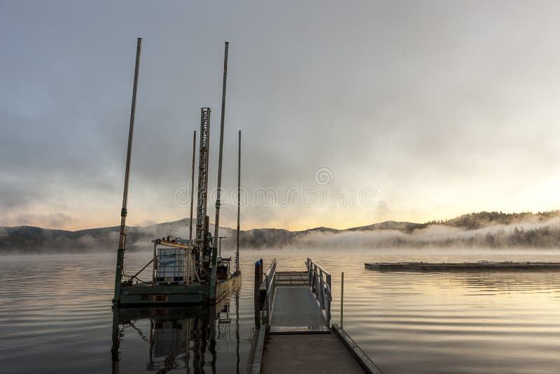 Barge at sunrise on lake. royalty free stock photography Barge at sunrise on lake. royalty free stock photography