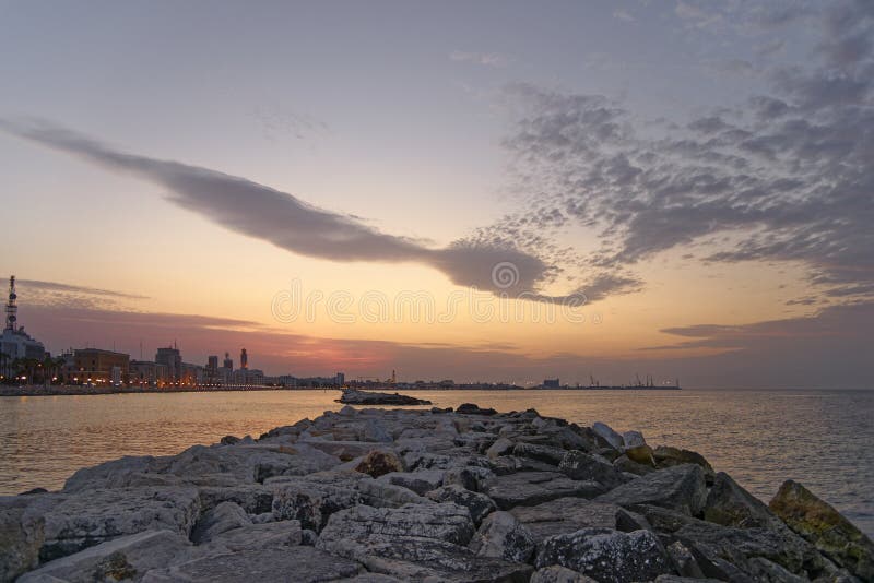 Sunset on the Adriatic sea coast in Bari, with Pane e Pomodoro beach. . Sunset on the Adriatic sea coast in Bari, with Pane e Pomodoro beach.