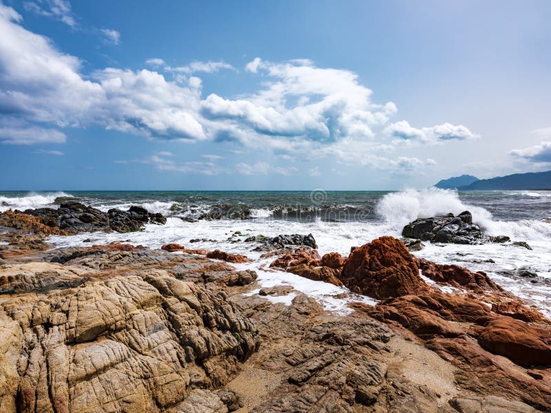 Shallow water, smooth rocks and an emerald sea in Bari Sardo, Ogliastra, Sardinia, Italy. Shallow water, smooth rocks and an emerald sea in Bari Sardo, Ogliastra, Sardinia, Italy