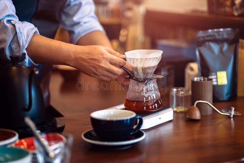 Barista Measuring Coffee Drip with Glass Mug Stock Image Image of