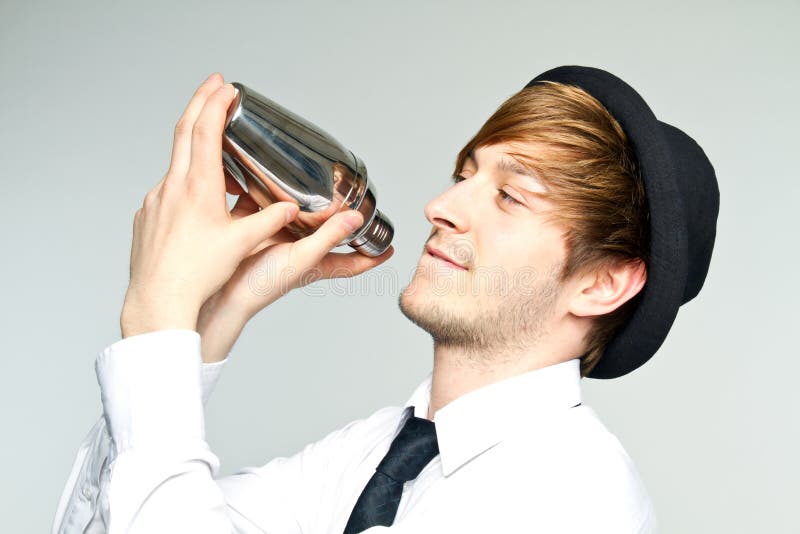 Barkeeper shaking cocktails