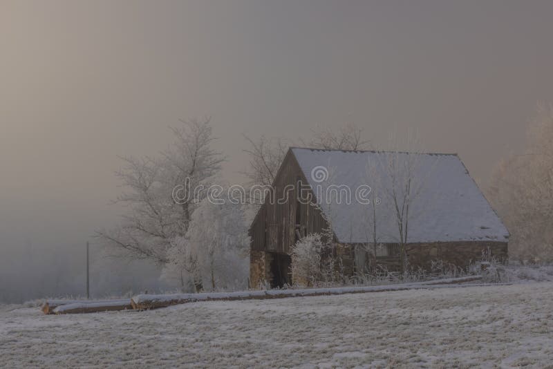Barn in Krusne mountains in snowy white landscape with frosty white trees, amazing, background, beautiful, blue, bohemia, branch, cold, color, coniferous, cover, czech, day, fantastic, forest, fresh, frozen, hill, holiday, horni, halze, christmas, ice, mist, morning, nature, outdoor, pine, republic, rime, scene, sky, spruce, stunning, travel, vacation, view, village, winter, wonderful, wonderland, wood, xmas. Barn in Krusne mountains in snowy white landscape with frosty white trees, amazing, background, beautiful, blue, bohemia, branch, cold, color, coniferous, cover, czech, day, fantastic, forest, fresh, frozen, hill, holiday, horni, halze, christmas, ice, mist, morning, nature, outdoor, pine, republic, rime, scene, sky, spruce, stunning, travel, vacation, view, village, winter, wonderful, wonderland, wood, xmas