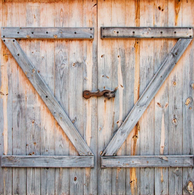 Barn door. Detail of wooden barn door Barn door. Detail of wooden barn door