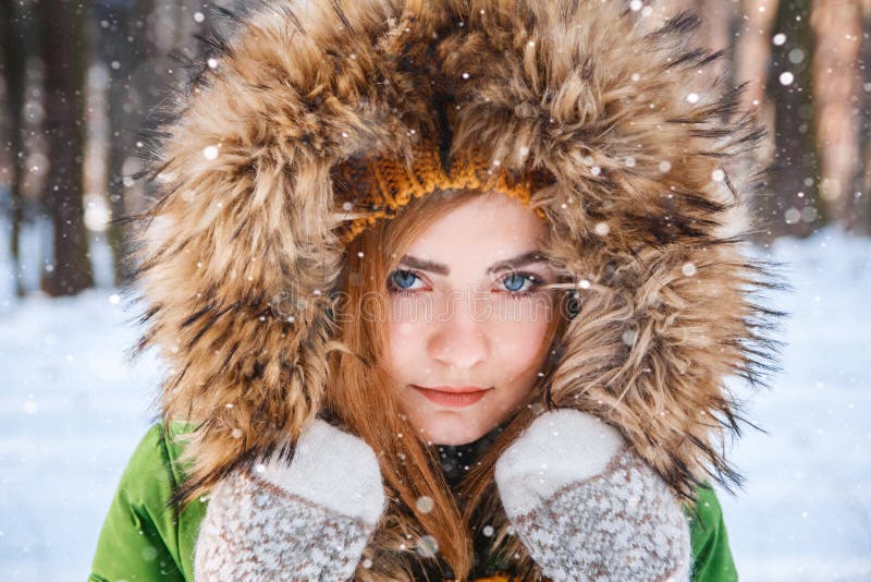 Young woman winter portrait. Close-up portrait of happy girl. Expressing positivity, true brightful emotions.