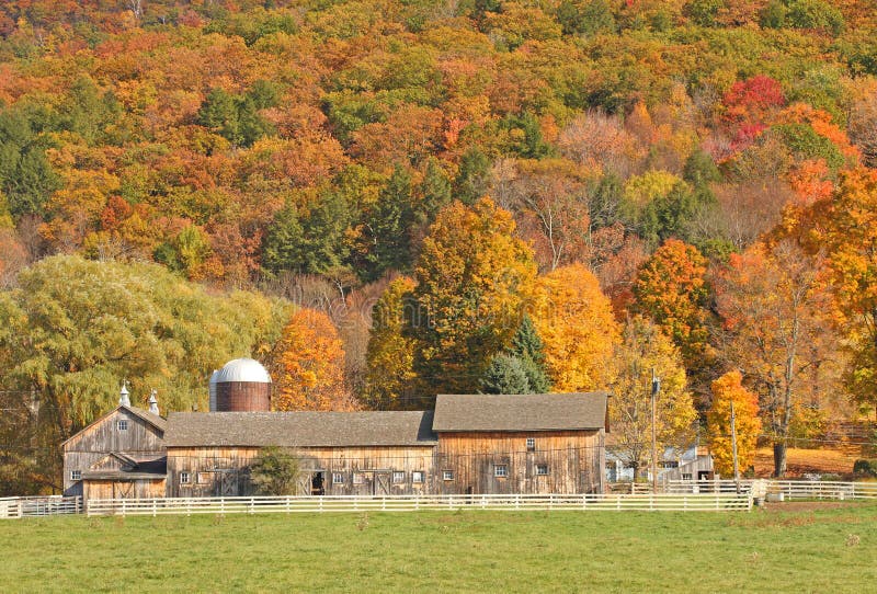 Barn, white fence and Autumn colors upstate rural New York. Barn, white fence and Autumn colors upstate rural New York