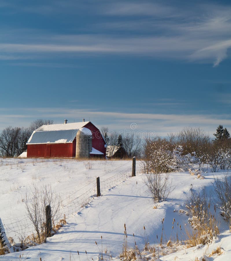 Barn on hill in winter