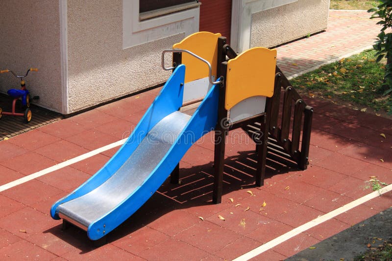 Children slide in a public park. Children slide in a public park