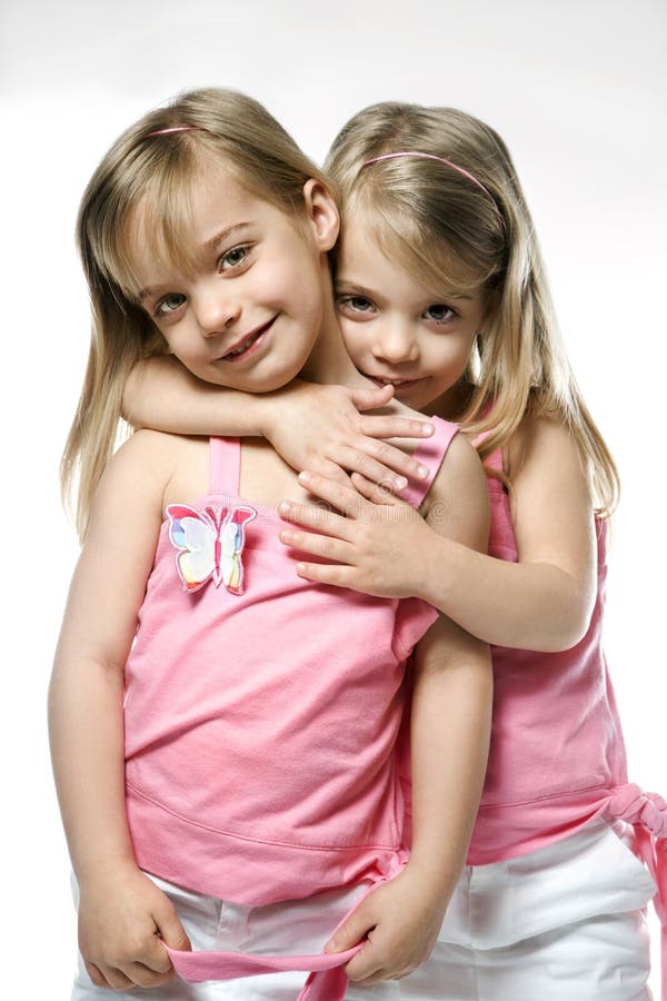 Portrait of female caucasian twins. Portrait of female caucasian twins.