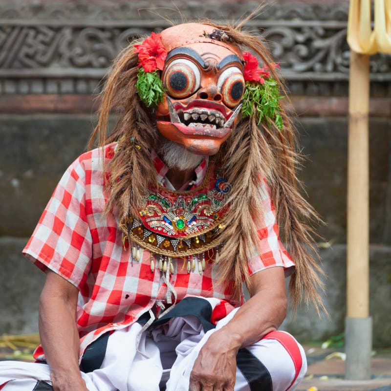 BALI - SEP 21: Barong and Kris Dance performs at Sahadewah, in Batubulan, Bali, Indonesia on Sep 21, 2012. This famous play represents an fight between good and bad gods. BALI - SEP 21: Barong and Kris Dance performs at Sahadewah, in Batubulan, Bali, Indonesia on Sep 21, 2012. This famous play represents an fight between good and bad gods.