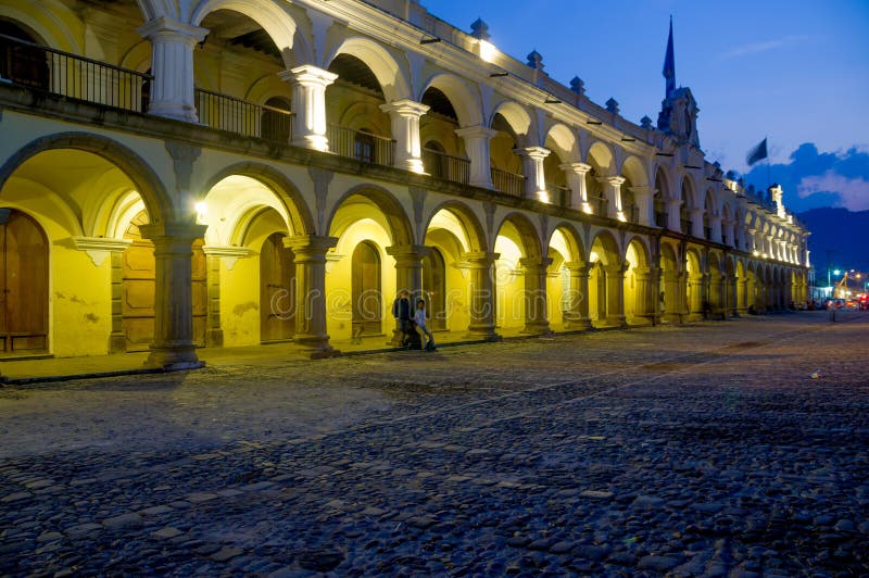 Beautiful sunset Baroque building in main square plaza Antigua Guatemala