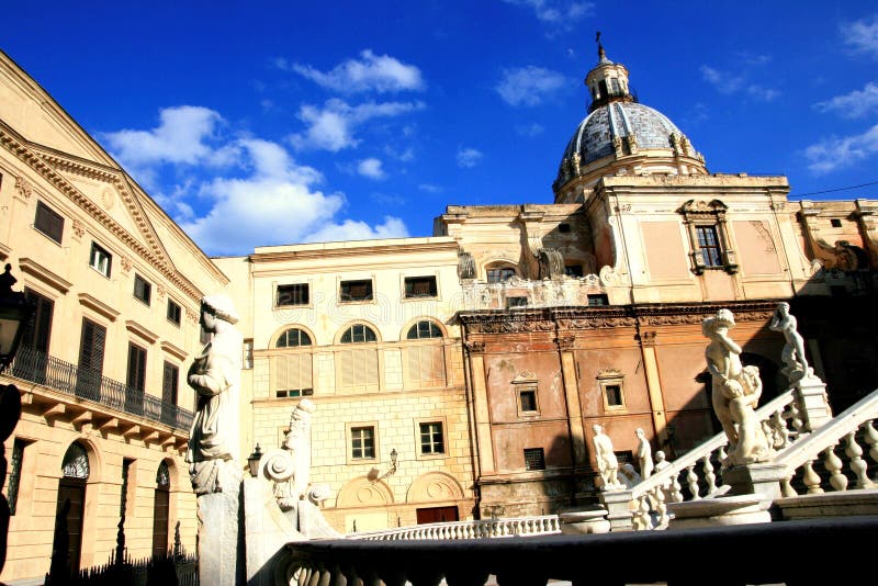 Baroque church & Pretoria square statues. Palermo