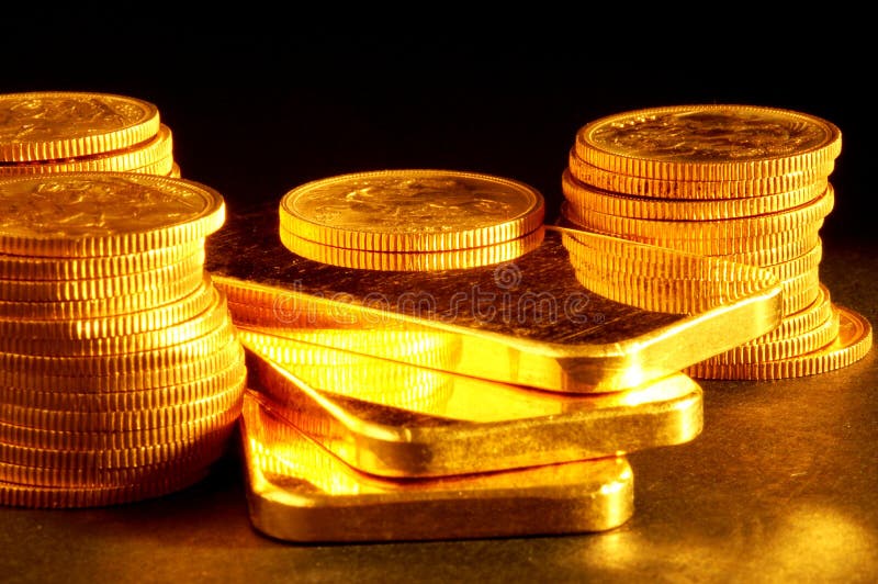 Barra y monedas de oro