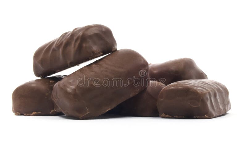 Barres de chocolat empilées d'isolement image libre de droits Barres de chocolat empilées d'isolement image libre de droits