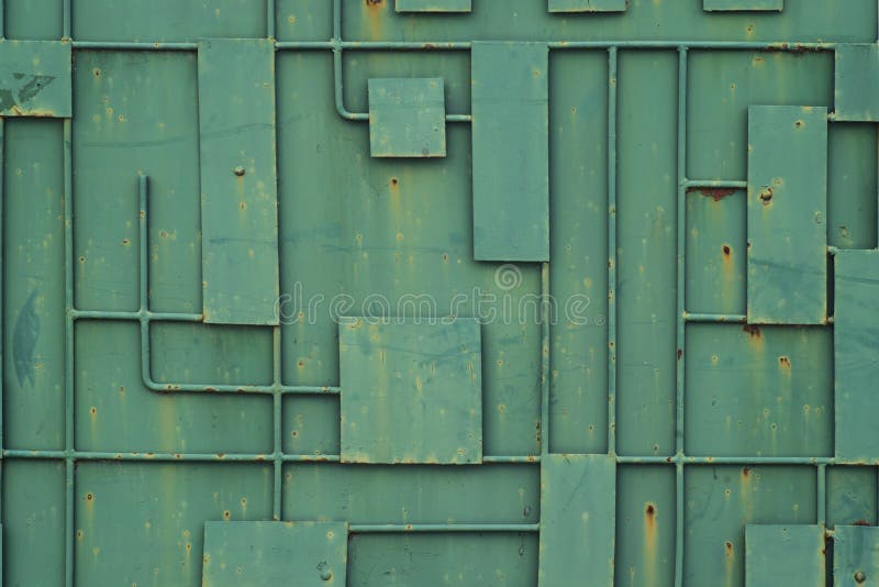 Barrière verte de fer avec un modèle des lignes géométriques du métal images libres de droits Barrière verte de fer avec un modèle des lignes géométriques du métal images libres de droits