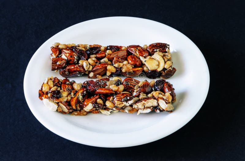 Bars with Almonds and Cranberries on a Plate Stock Image Image of