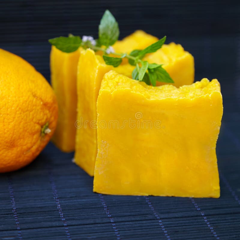 Bars of natural orange soap stock photos