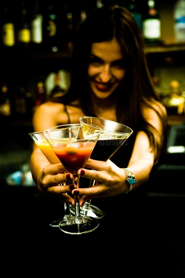 Barkeeper serves Margarita stock photo. Image of barstool 805800