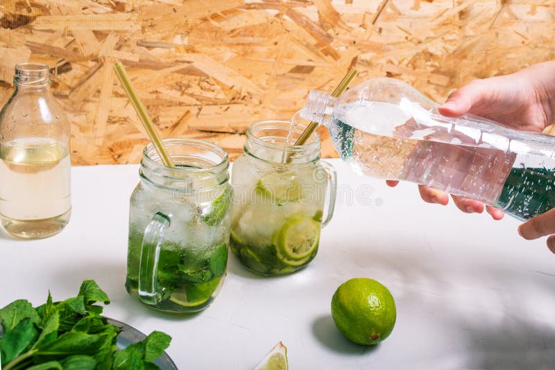 Cocktail mojito in plastic glass with ice Stock Photo by ©eduardkraft  11955436