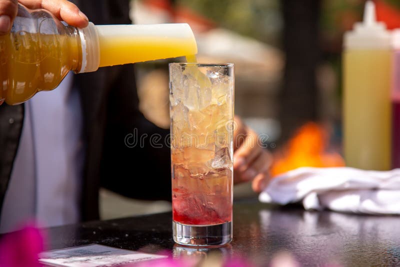 Bartender makes drinks stock photo. Image of alehouse 166693326