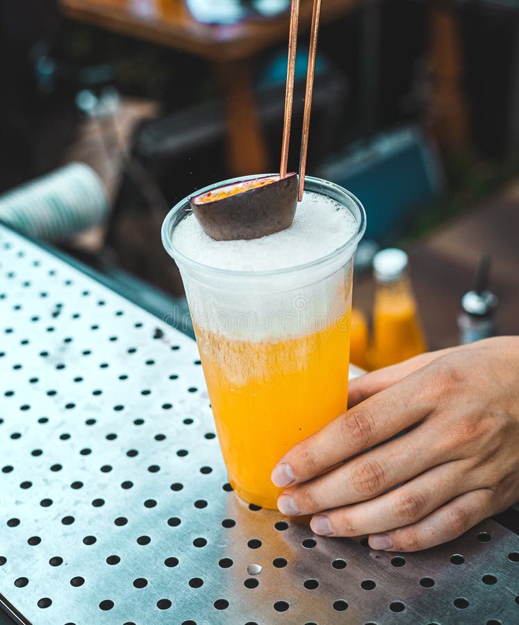 The Bartender Prepares a Cocktail with Passion Fruit Stock Image