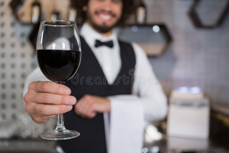 Bartender Serving Glass of Red Wine in Bar Counter Stock Image Image of male, people 78711325