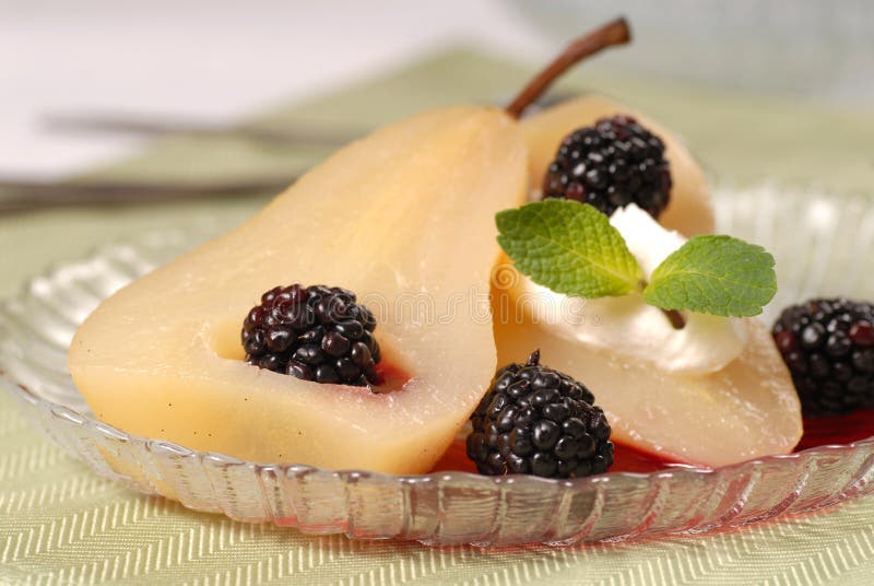 Bartlett pear poached in wine with blackberries